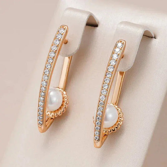 Elegant pointed earrings with pearl and zirconia in gold Claire