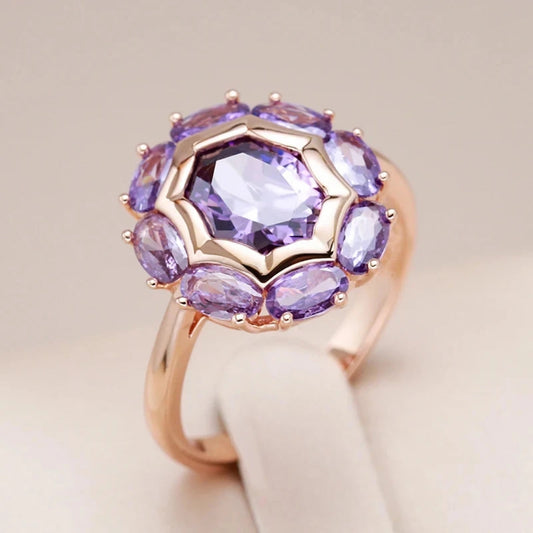 Ring with rounded violet crystal